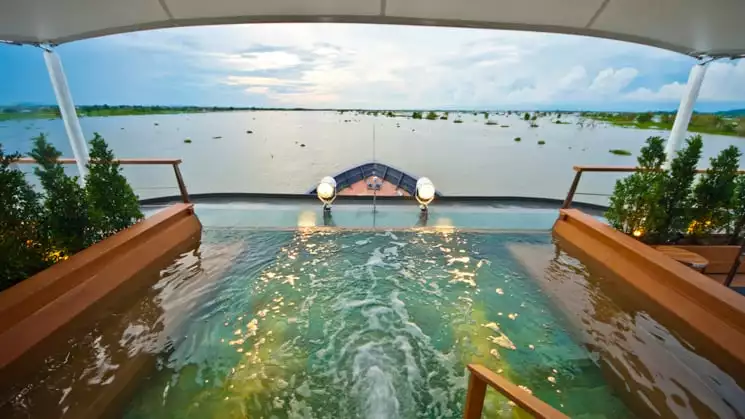 Aqua Mekong Outdoor Top Deck Plunge Pool with a view of bow and river.