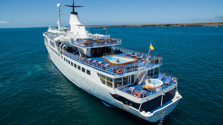 Galapagos Legend seen from above sailing showing the pool on the stern.
