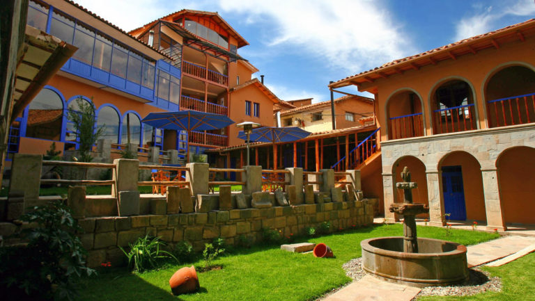 The fountain and lawn in the courtyard at hotel Casa Andina Premium in Cusco, Peru.