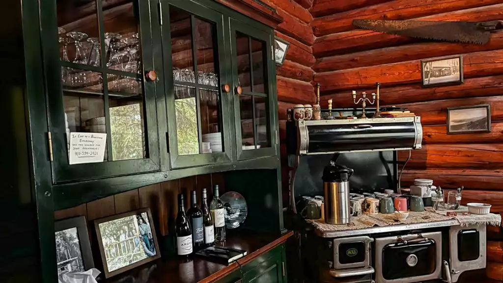 Main cabin with kitchen, dining room and communal spaces at Kenai Backcountry Lodge.