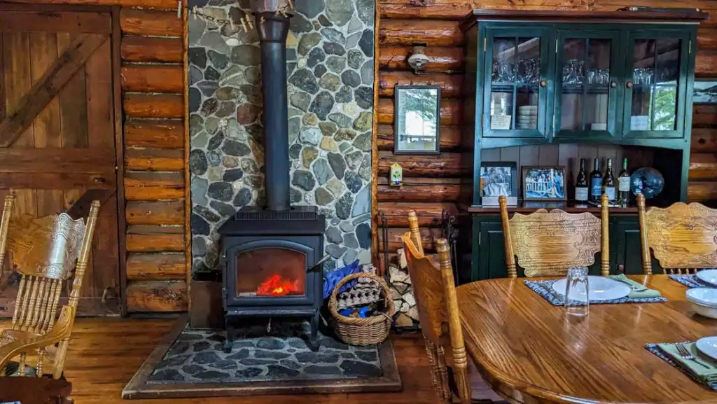 Main cabin with kitchen, dining room and communal spaces at Kenai Backcountry Lodge.