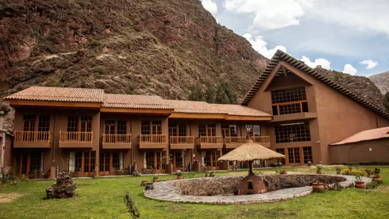 The exterior of the mountain lodges in Peru's Lares Region, a sustainable accommodation