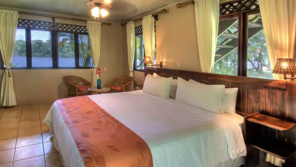 River View Downstairs Terrace Room with King Bed at Tortuga Lodge

