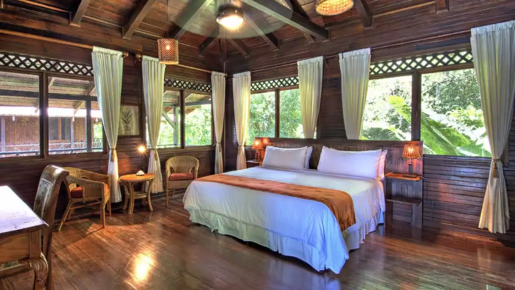 River View Upstairs Balcony Room with King Bed at Tortuga Lodge

