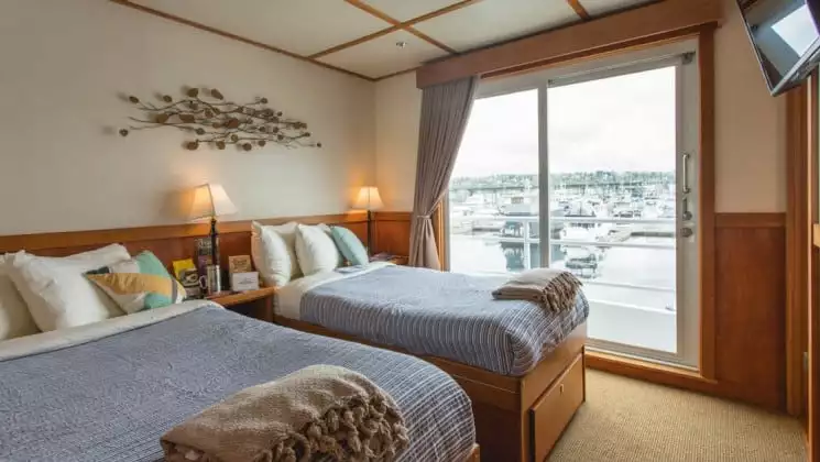 Admiral Stateroom A1 with twin beds aboard Safari Quest. Photo by: UnCruise