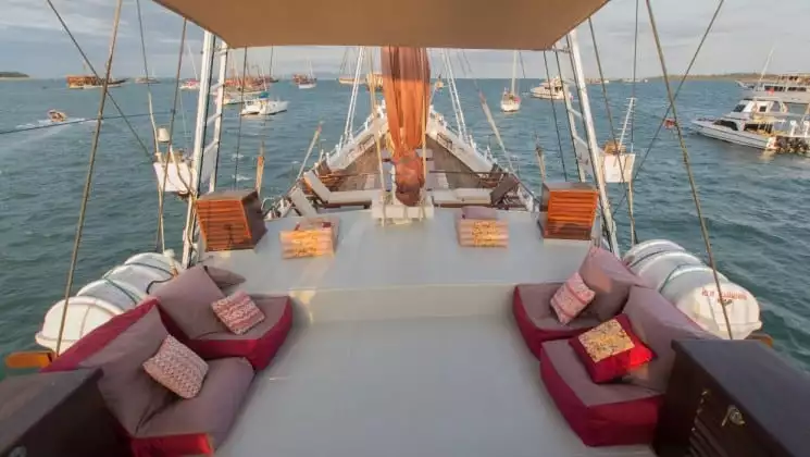 Katharina sailboat outdoor deck with couches, chairs and lounge chairs.