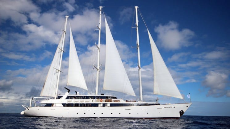panorama Mediterranean luxury yacht in full sail on a sunny day