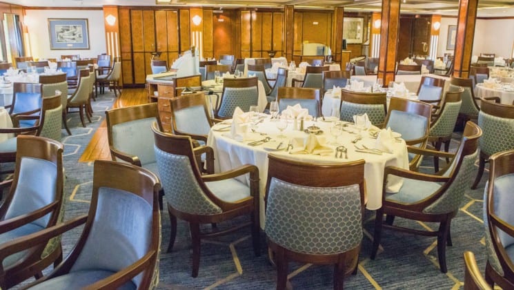 Elegant table settings in dining room aboard Sea Spirit expedition ship