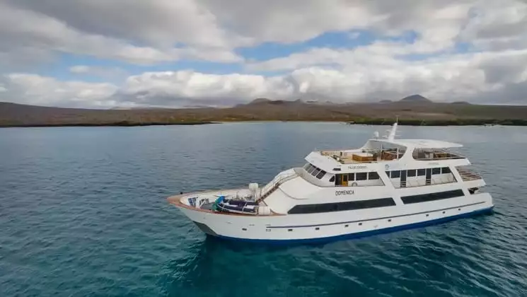 Aerial of port side and bow of Sea Star Journey luxury yacht in the Galapagos Islands