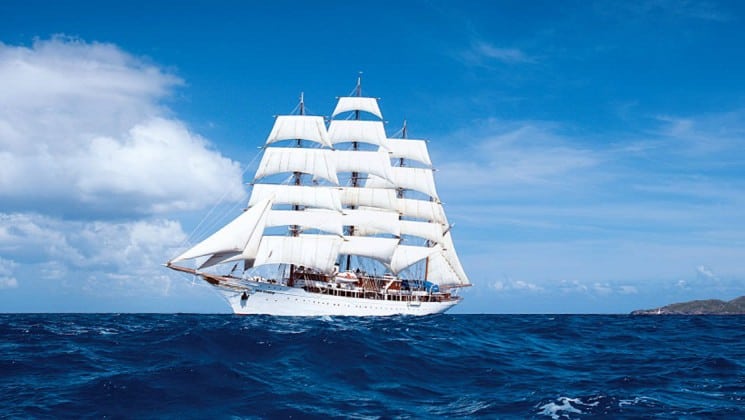 Sea Cloud luxury sailboat cruising in the Mediterranean on a sunny day