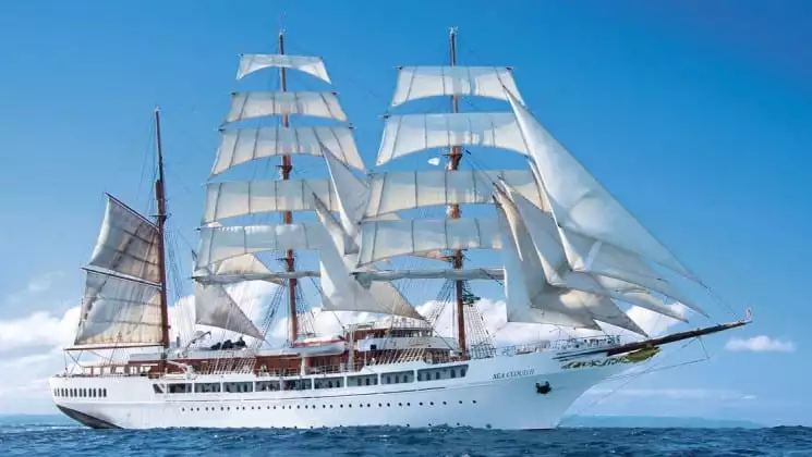 sea cloud ii mediterranean luxury yacht sailing on calm waters on a sunny day
