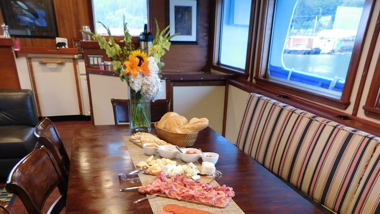 Hors d'ouvres set up on table in dining room aboard Sikumi small ship Alaska cruise