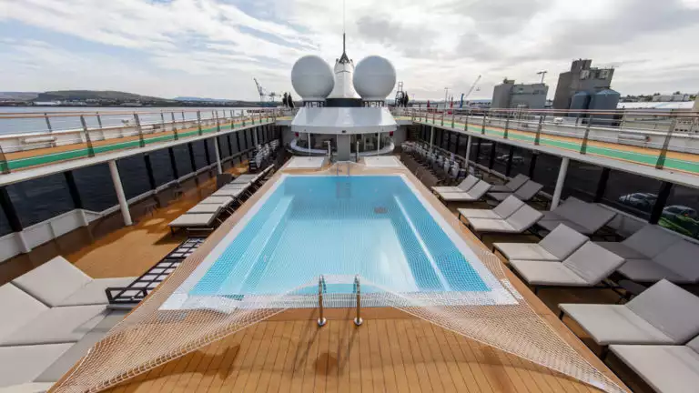 Top Deck pool and chaise loungers aboard polar small ship World Explorer.