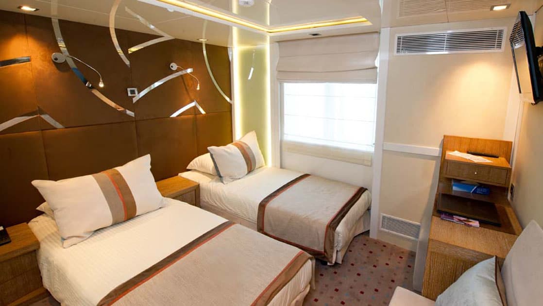 Category B cabin with 2 twin beds aboard Varitey Voyager.