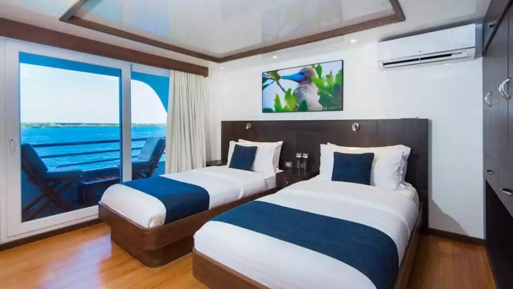 Standard cabin with twin beds aboard the Cormorant