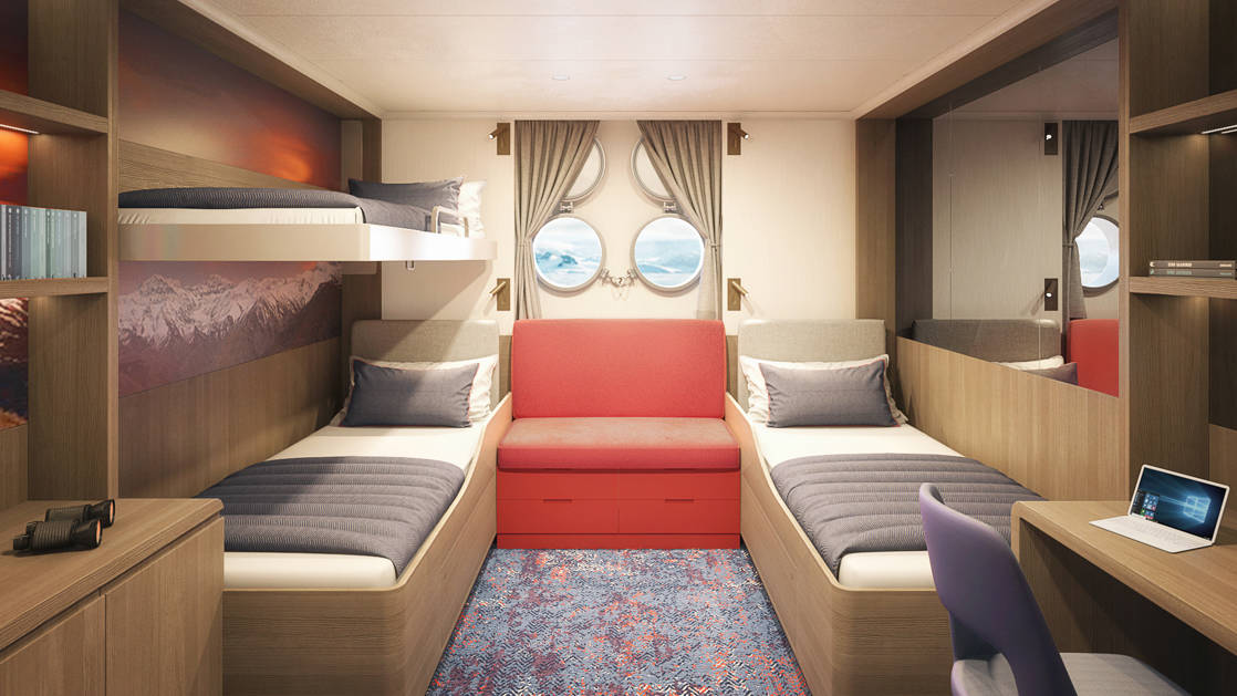 Hondius and Janssonius Triple Porthole stateroom with 3 berths, seating, desk and 2 small portholes.