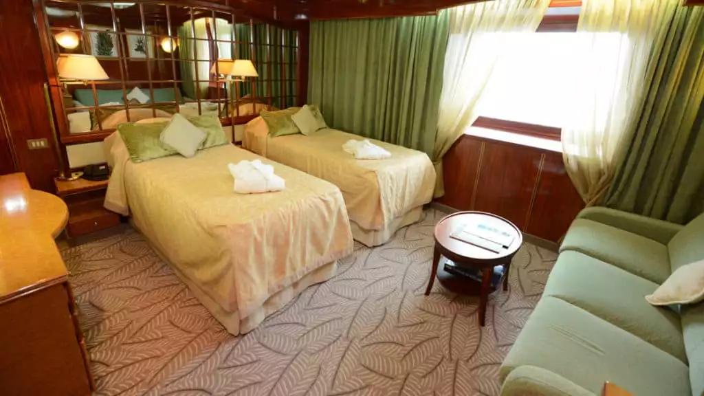 Promenade Suite with twin beds aboard Island Sky