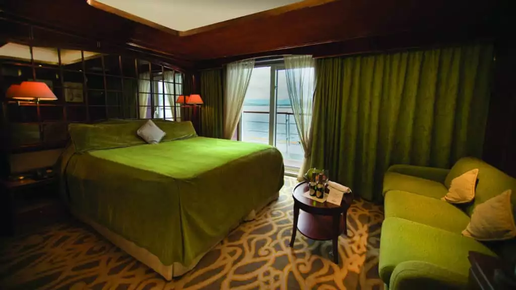 Promenade Suite with queen bed aboard Island Sky