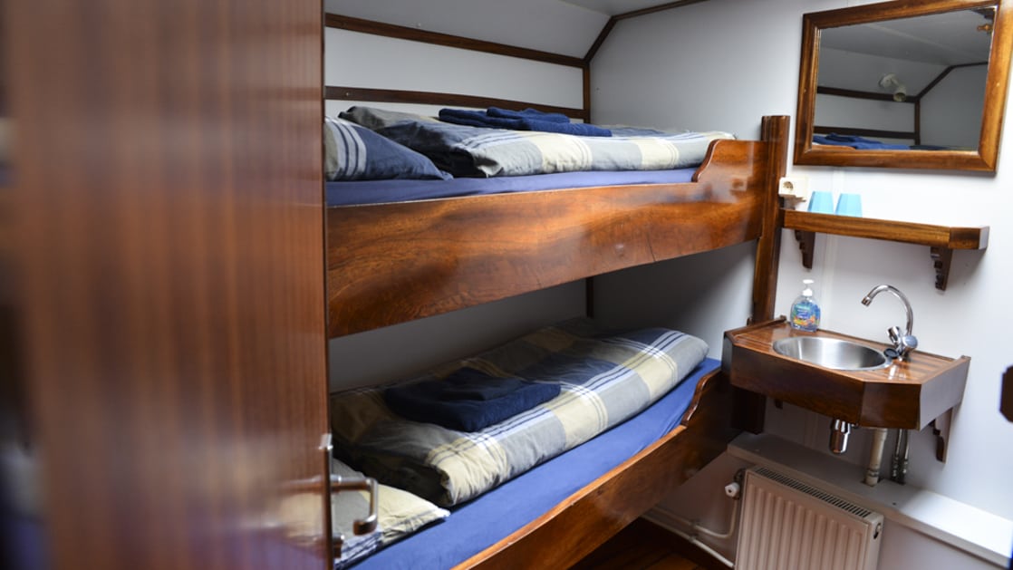 Noorderlicht ship cabin showing 2 bunk beds