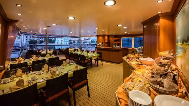 large dining room on the upper deck with buffet set with food aboard Panorama II