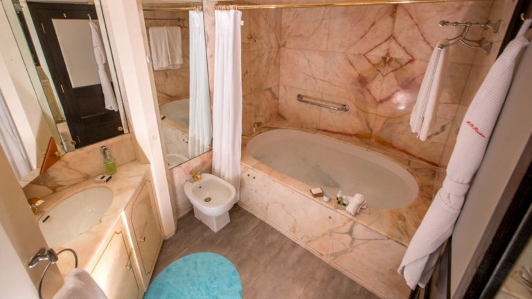 Marble bathroom and tub aboard Passion