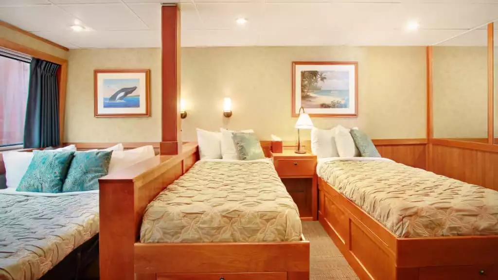 Admiral Stateroom with triple beds aboard Safari Explorer 
