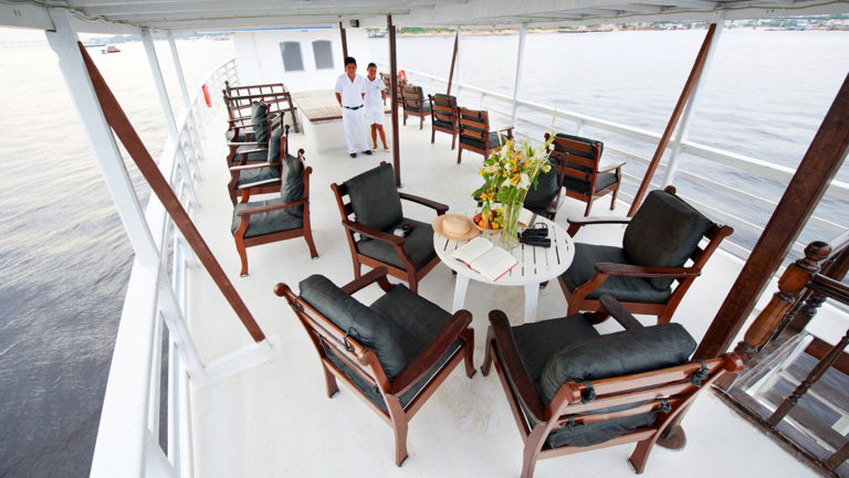 Chairs and table on the bow of Tucano.