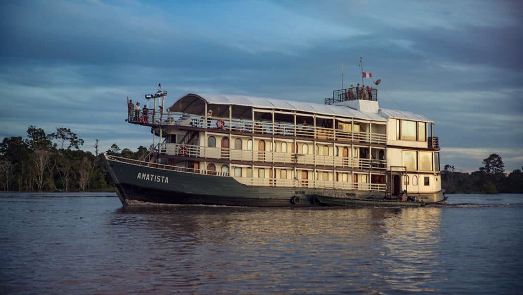 Amatista river boat cruising in the Peruvian Amazon.