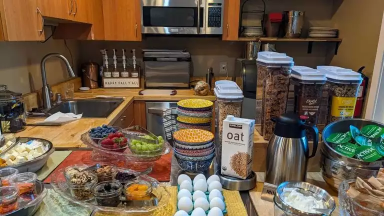 Breakfast food likes eggs and cereal. put on display for hotel guests to have in the morning