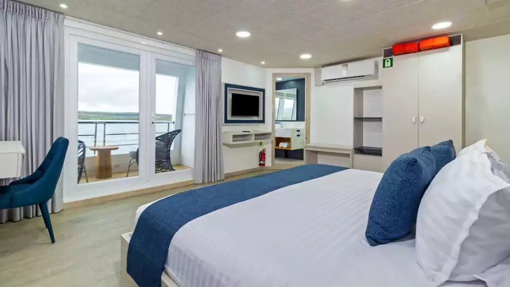 Upper Deck Suite with double bed aboard Cormorant II