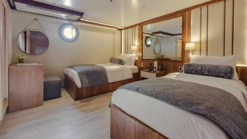 Cormorant Deck Premium Stateroom with twin beds aboard the Evolution