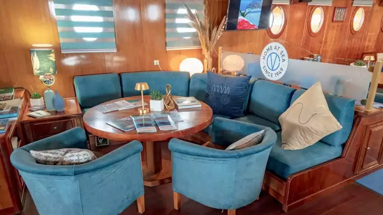 Plush and comfortable lounge to gather together and discuss the day aboard the Galileo while cruising the Aegean sea Mediterranean