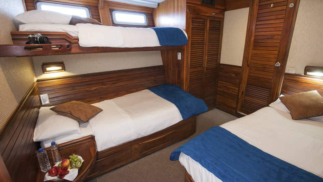 Letty stateroom Triple cabin with double bed and 2 twin berths, 2 windows, nightstand, closet and bathroom.