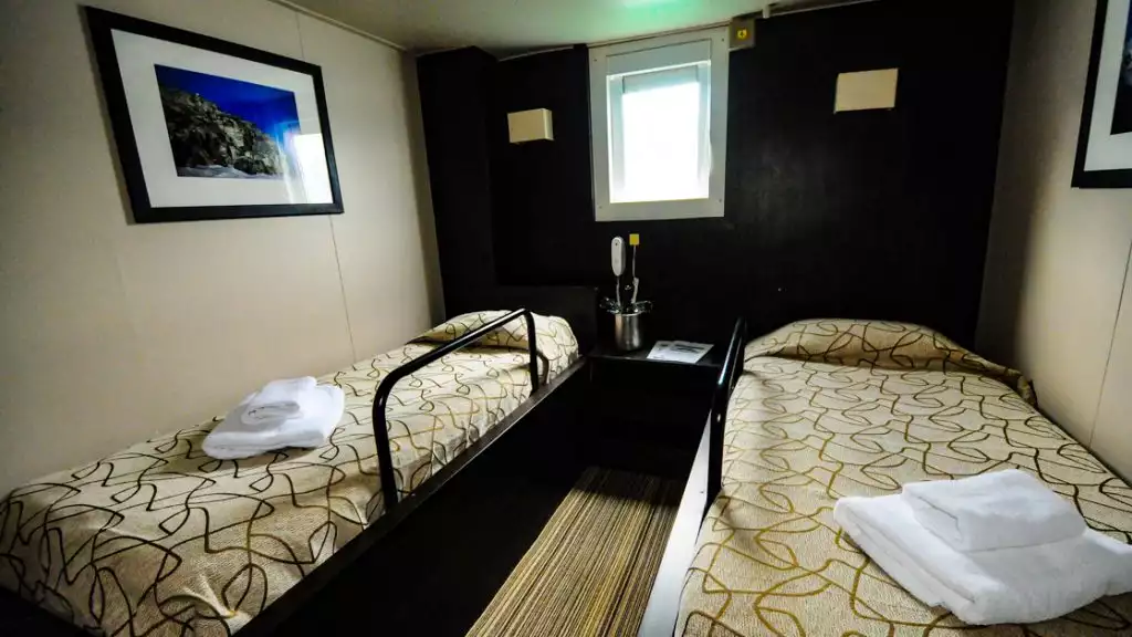 Suite Twin Cabin with twin beds aboard Ushuaia