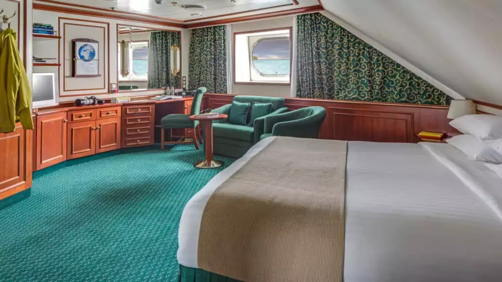Category 3 Cabin #415 aboard National Geographic Orion. Photo by: Marco Ricca/Lindblad Expeditions