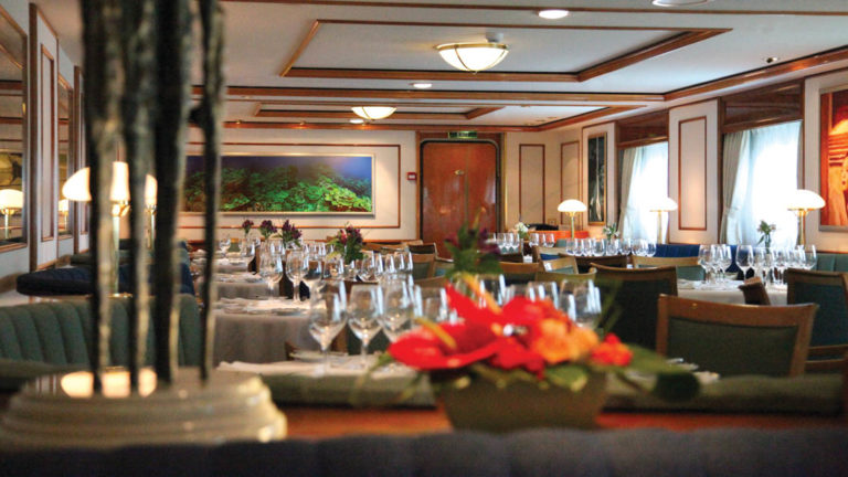 Fresh flowers in the elegant dining room on the National Geographic Orion expedition ship
