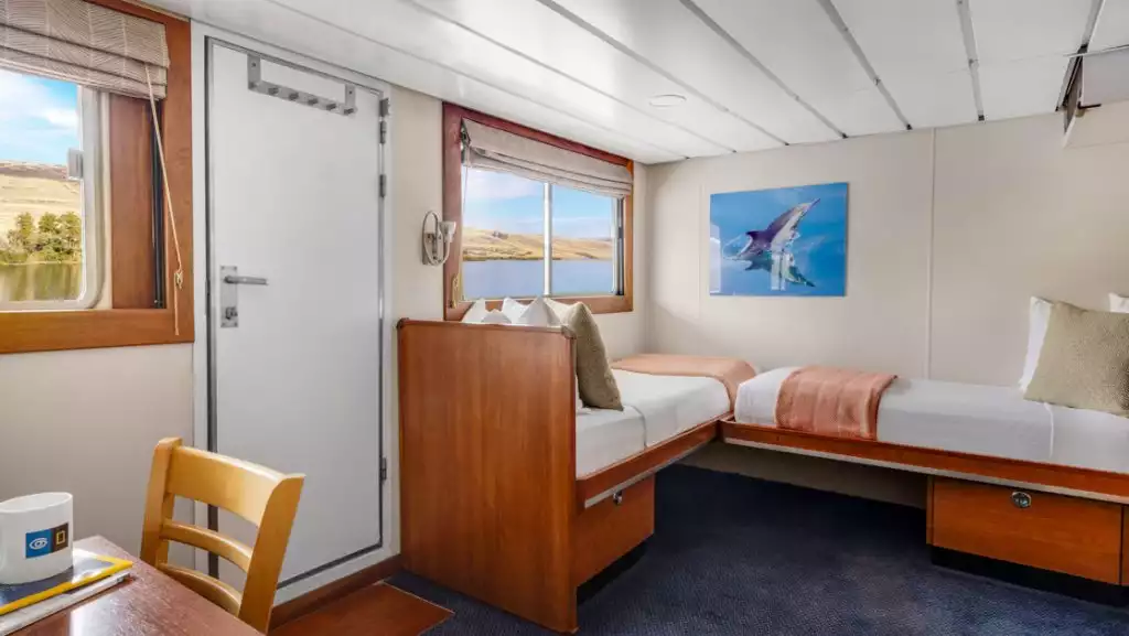 Category 3 cabin (#105) with fixed twin beds aboard Sea Bird & Sea Lion. Photo by: Douglas Scaletta