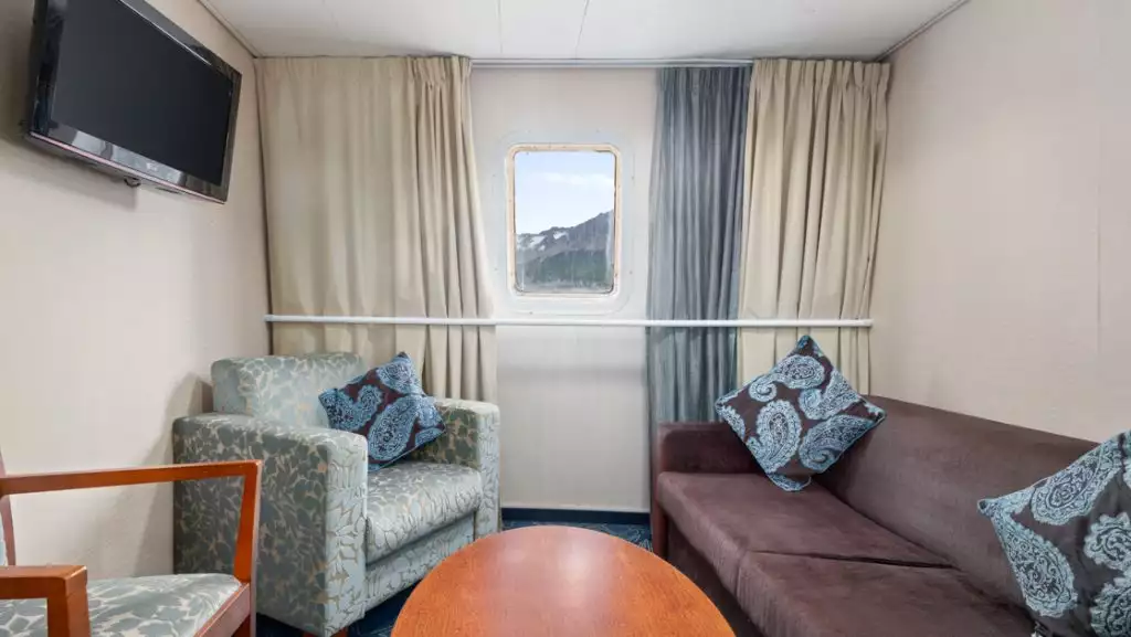Category 10 Owner's Suite living room aboard Ocean Endeavour