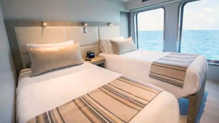 Double cabin with twin beds aboard Origin, Theory & Evolution