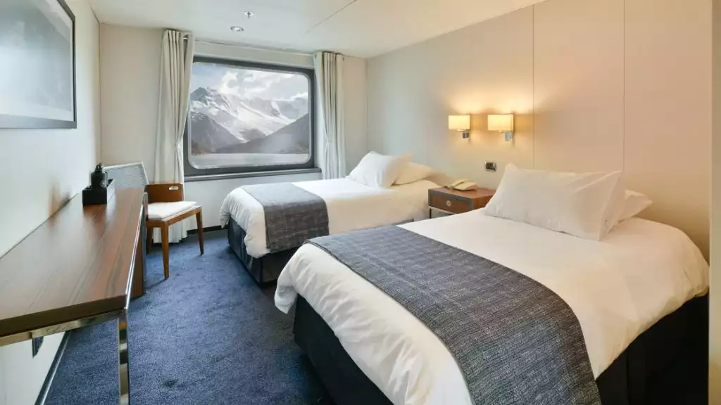 Category A cabin with twin beds aboard Stella Australis 