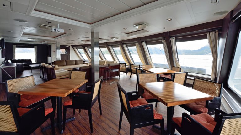 The Stella Australis in Chilean Patagonia features the Yamana lounge with banks of windows that look to the front of the ship
