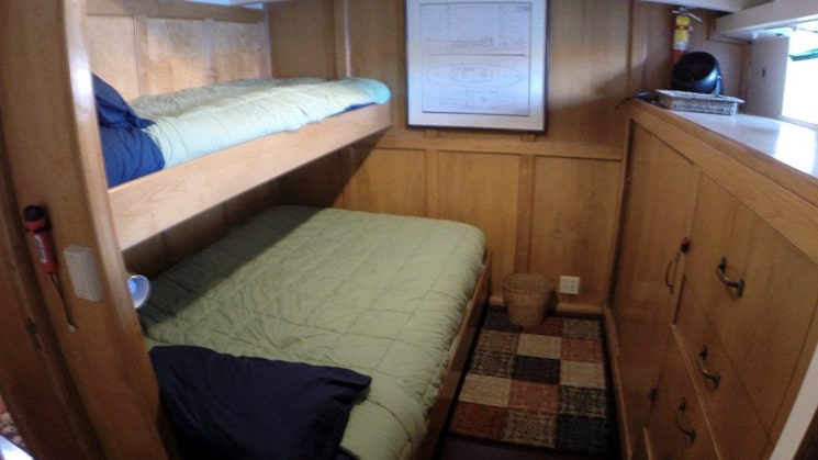 Cabin 3 with hanging locker and 10 built-in drawers aboard the westward.