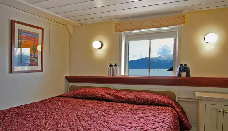 Trailblazer cabin with queen bed aboard Wilderness Adventurer