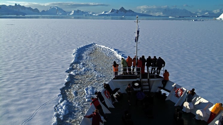 The view of the trail cut through the sea ice by an icebreaker ship in antarctica