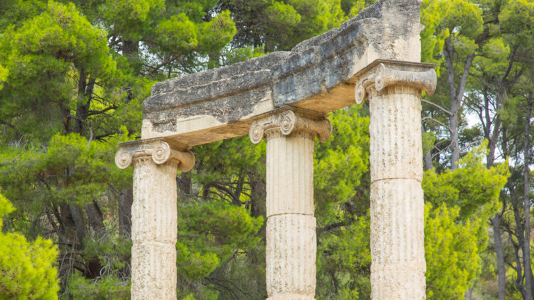 Marble columns in the Olympia Archaeological Site of the first Olympic Games. seen from the under sail small ship cruise from Greece to the Dalmatian coast Greece