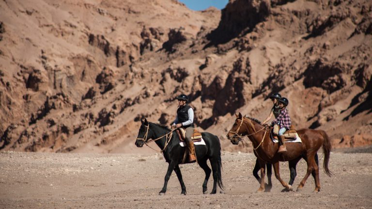 Ride horses on Atacama desert on this epic land tour where you will see the hidden beauty of this Chilean desert with Explora