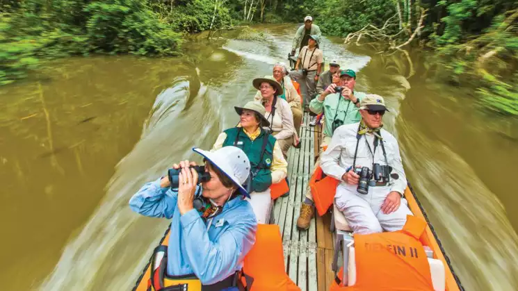 Take a skiff tour and bring your binoculars to scope out the animals while with the National Geographic Upper Amazon River Cruise
