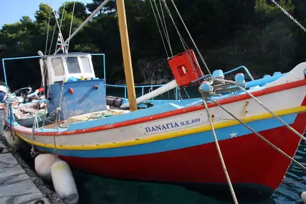 Colorful fishing boat in Paxos, Greece. 