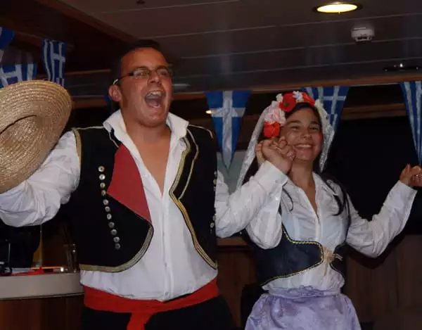 Greek Dancing in traditional clothes aboard small ship cruise in Adriatic. 