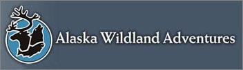 Alaska Wildland Adventures blue logo with wolf, fish and caribou. 